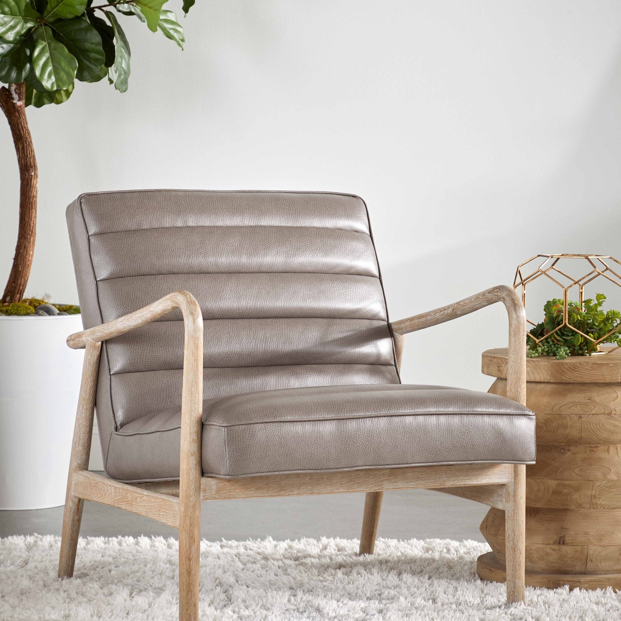 Essentials for Living Tahoe Club Chair in gray synthetic leather with natural oak frame and horizontal channel tufting