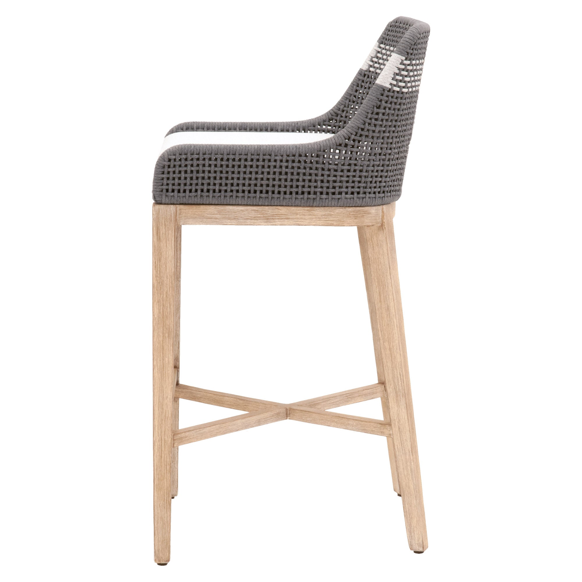 Side view of Essentials For Living Tapestry Barstool with gray woven seat and natural wood legs featuring an X stretcher base