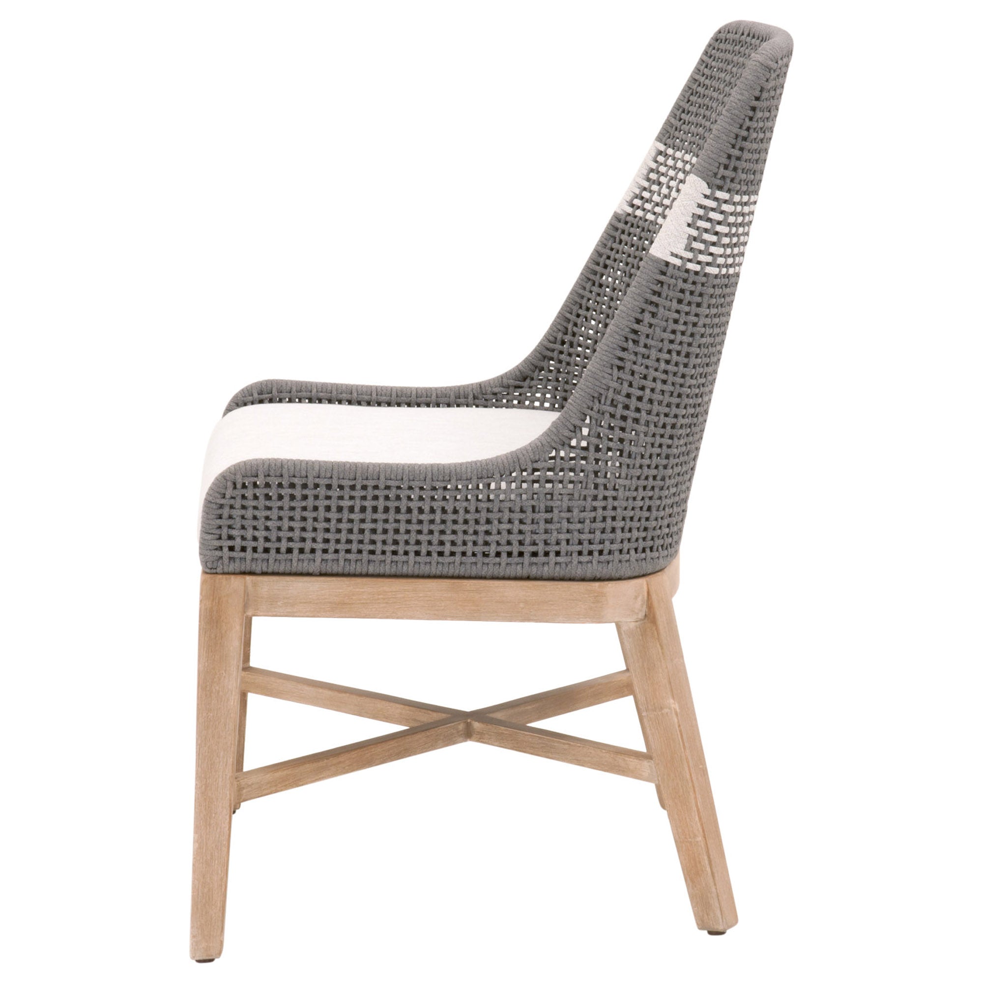 Side view of a woven tapestry dining chair with gray rope backrest and natural distressed wood legs