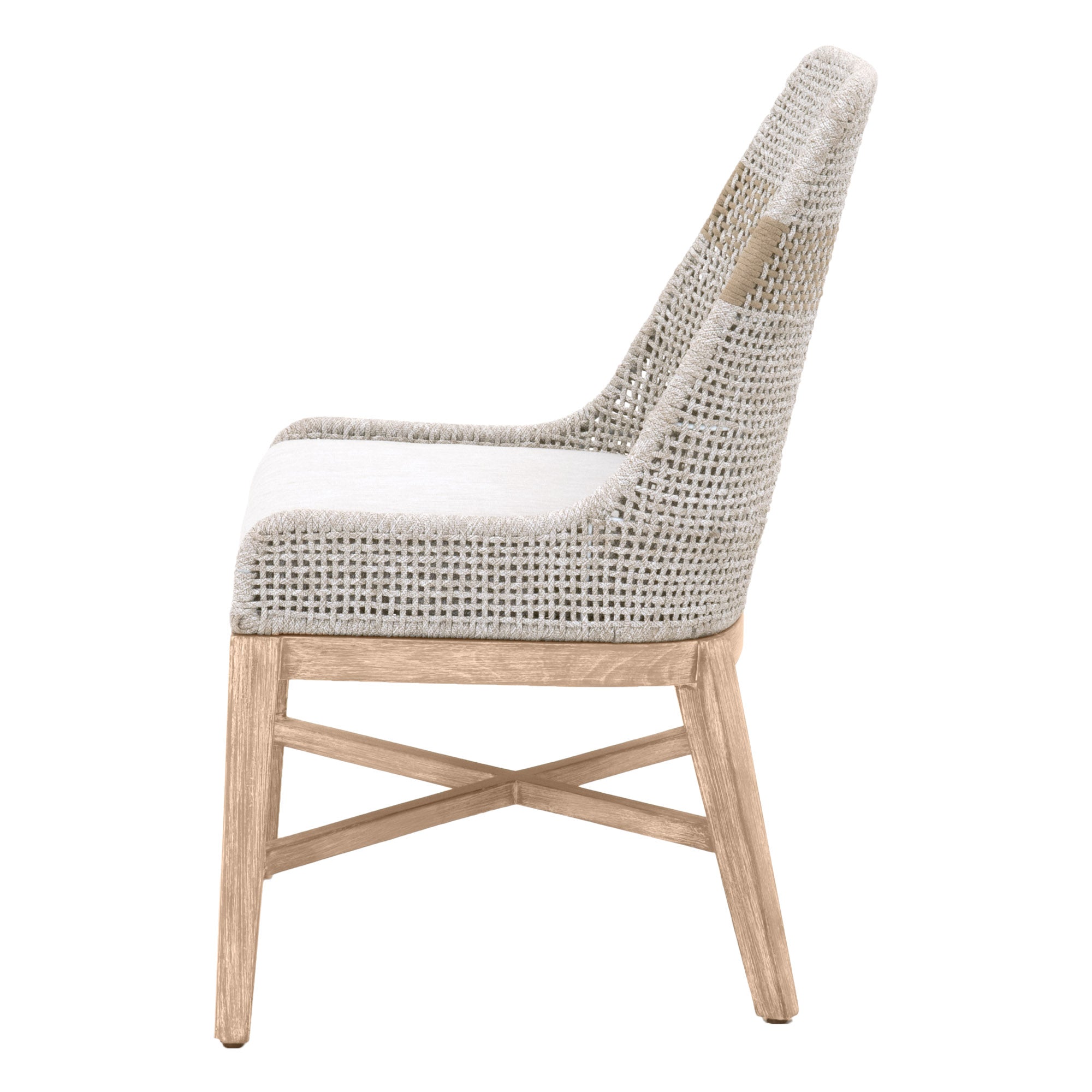 Side view of Essentials For Living tapestry dining chair with woven back and natural gray wooden legs
