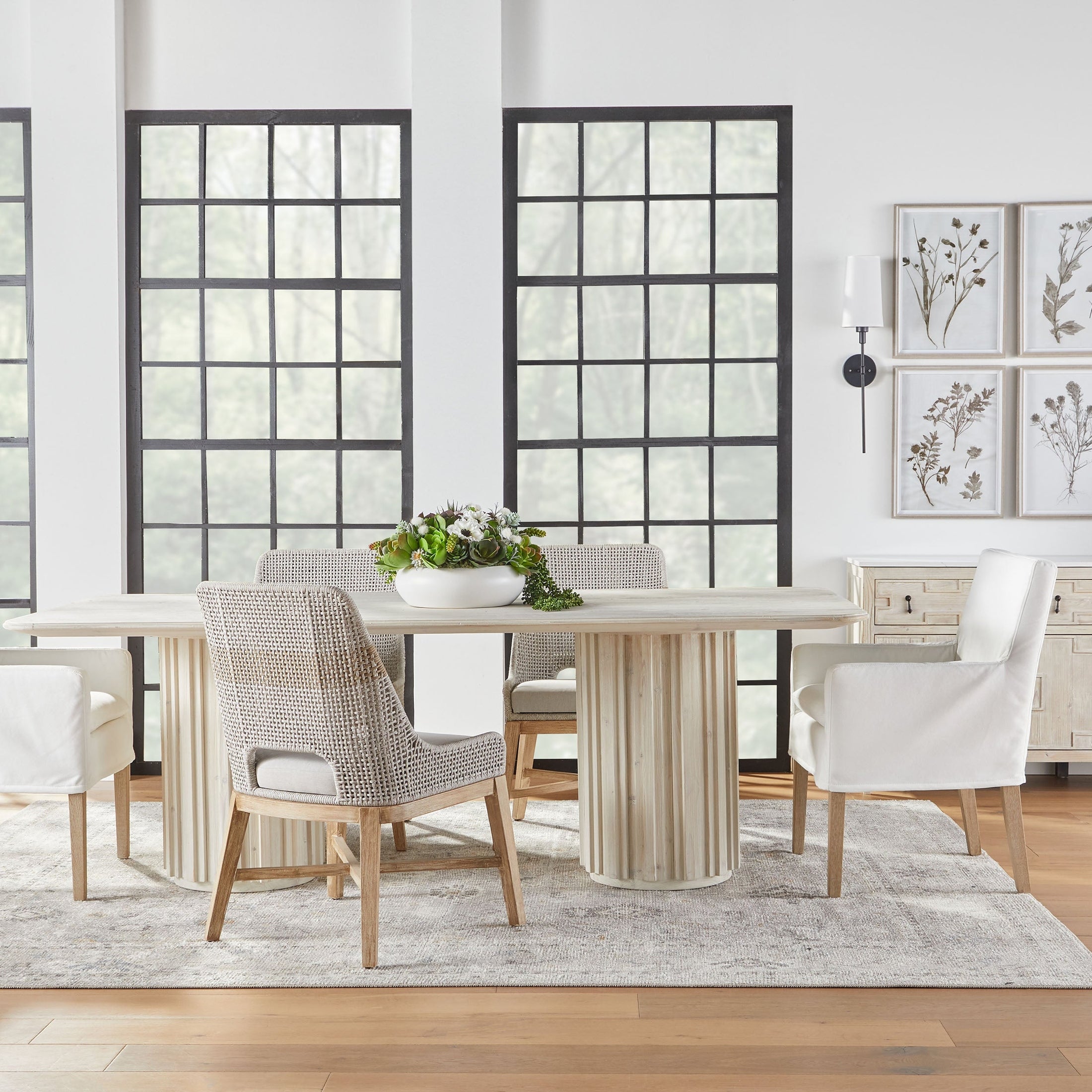 Set of two Essentials For Living tapestry dining chairs with woven taupe pattern and mahogany legs in a bright dining room