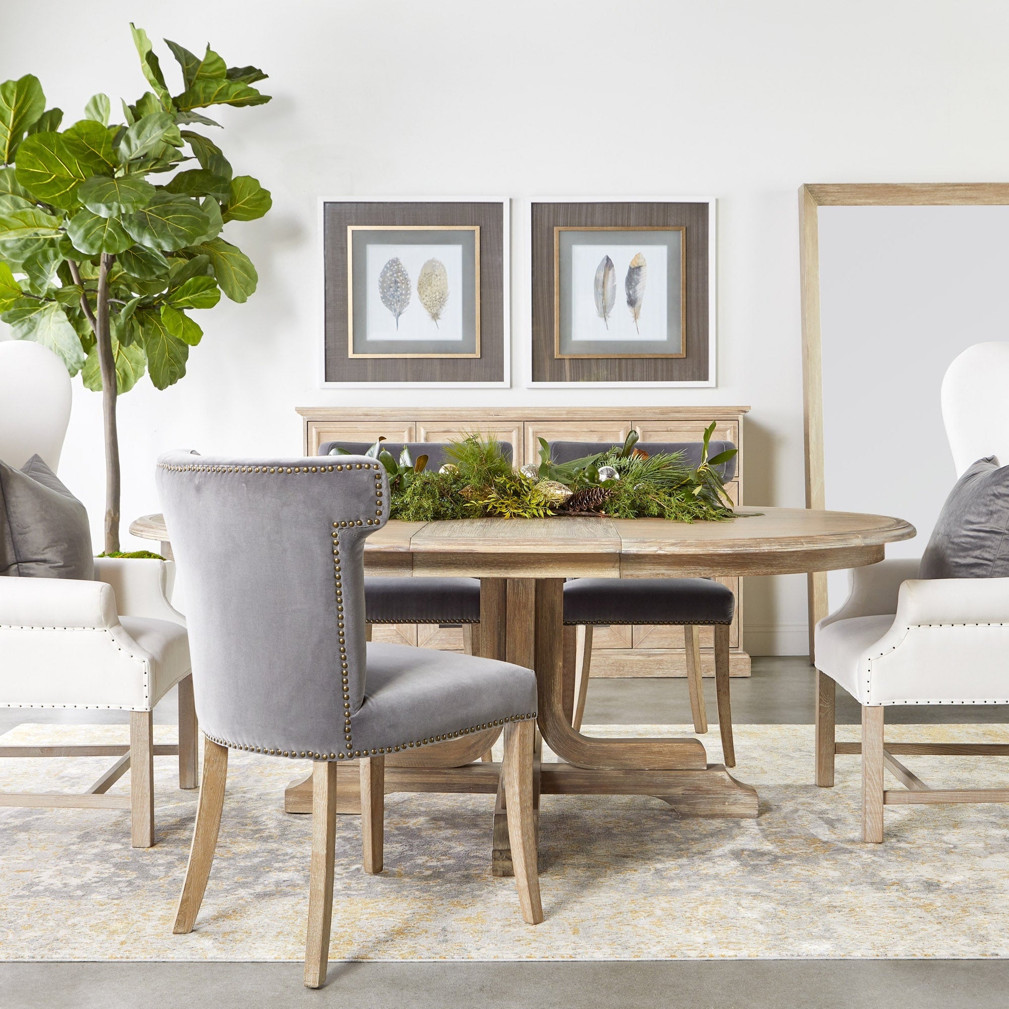 Essentials for Living Torrey 60 inch round natural gray acacia extension dining table with mixed chairs and decor