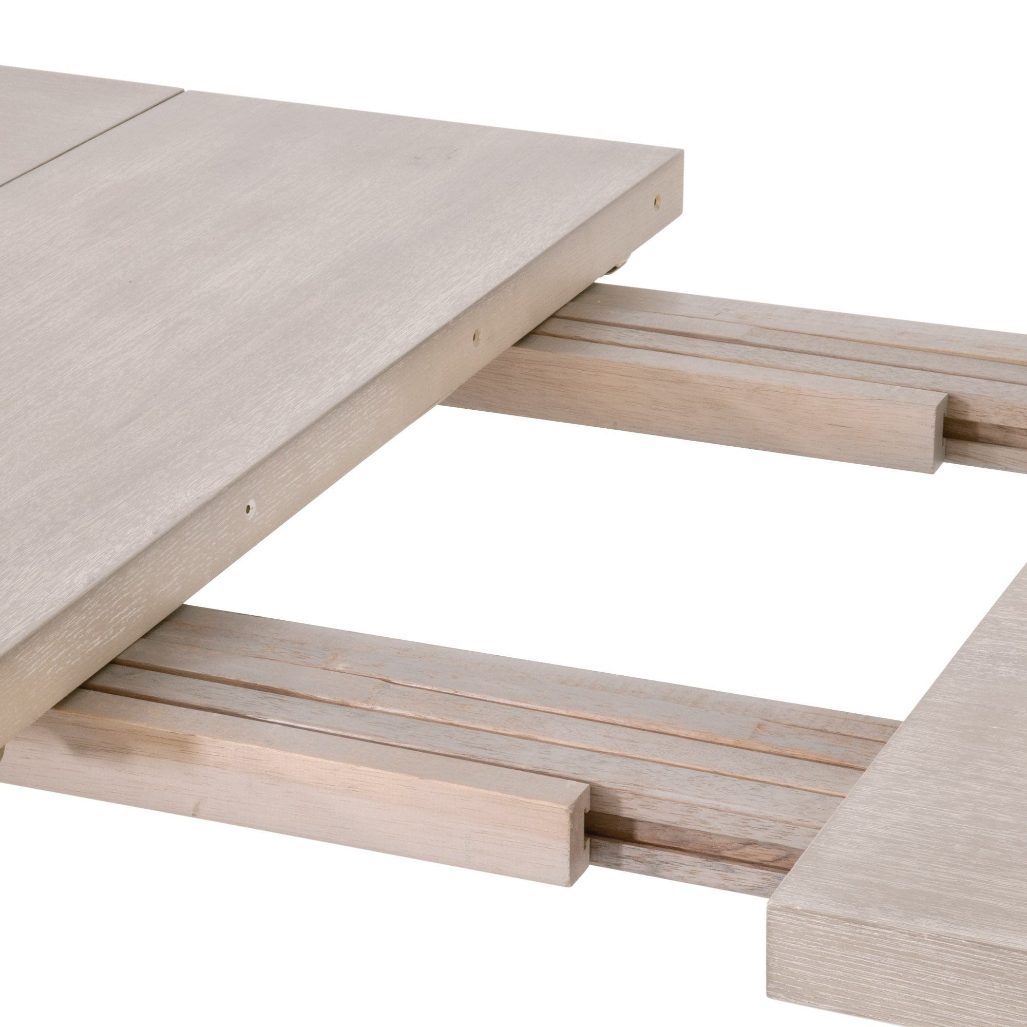 Essentials For Living Tropea Extension Dining Table in natural gray acacia showing extended mechanism and wood grain detail.