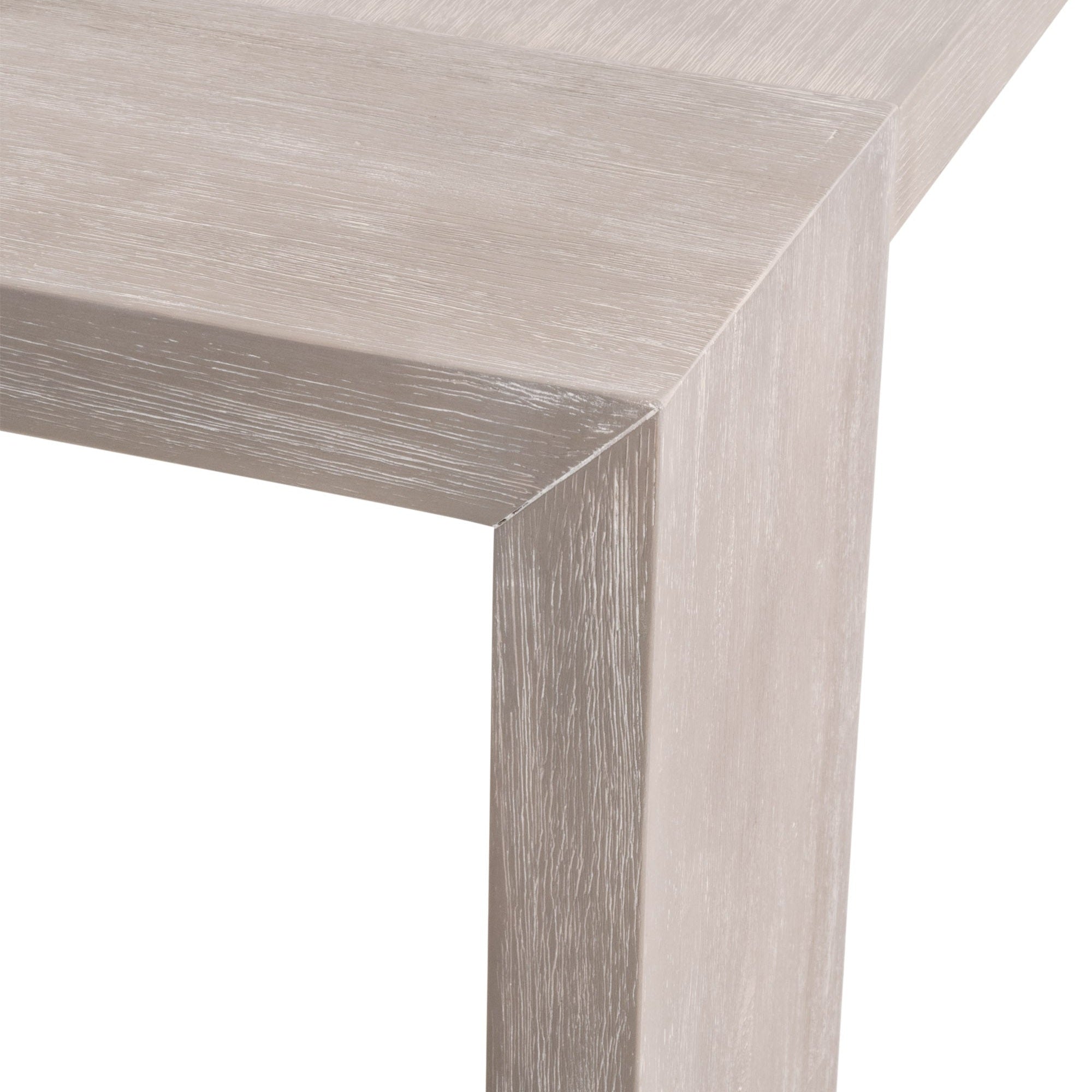 Close-up of the natural gray acacia wood corner on the Tropea Extension Dining Table by Essentials for Living