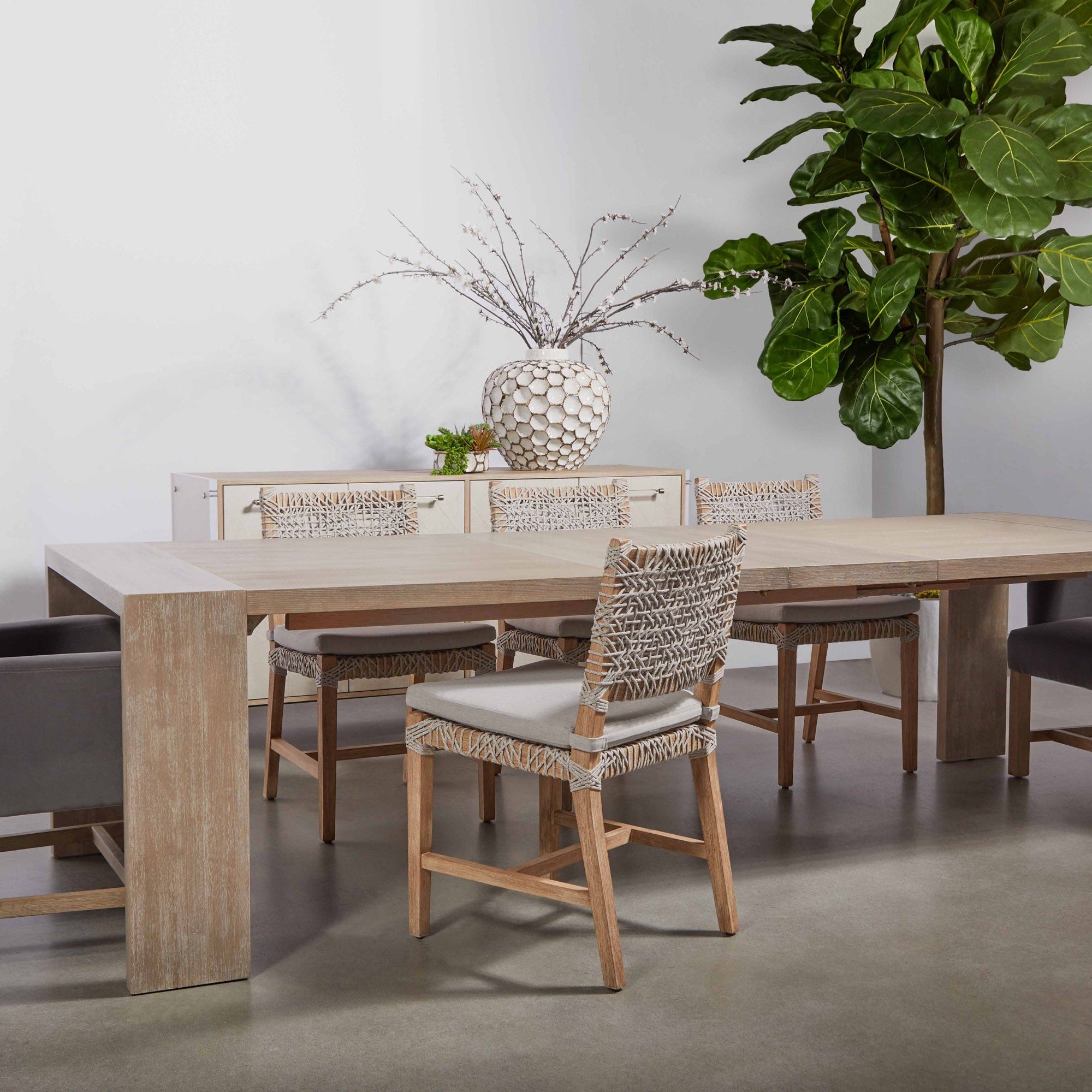 Natural gray acacia Tropea Extension Dining Table by Essentials for Living with clean lines and wide squared legs