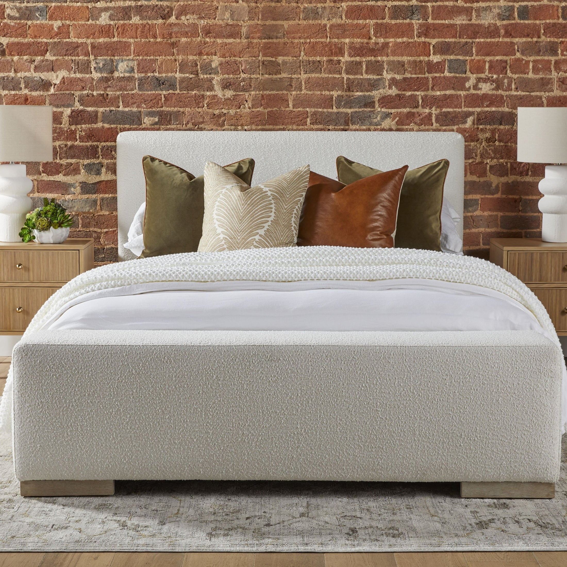 Warren Queen Bed by Essentials for Living in white boucle fabric with solid oak legs and extra-wide footboard bench