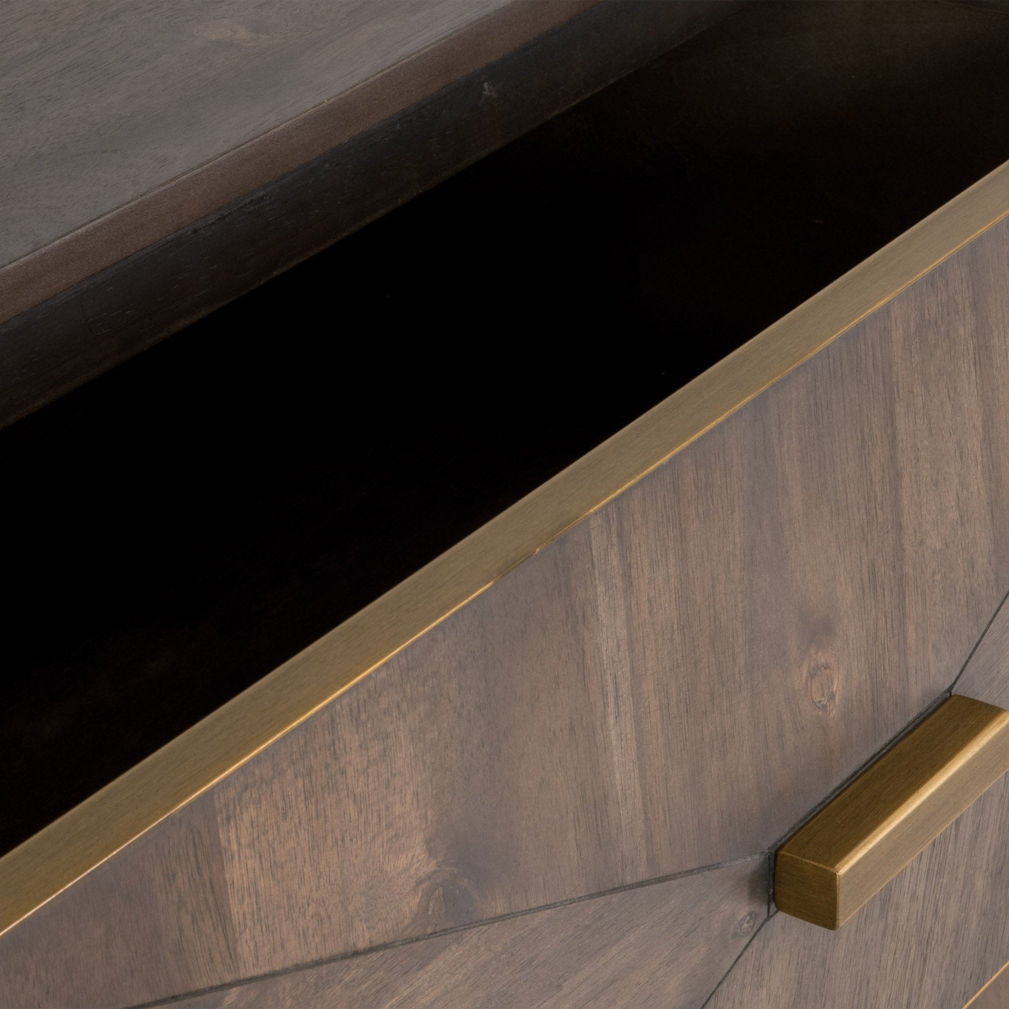 Close-up of burnished brown acacia veneer drawer with brushed gold rectangular handle from Wynn 6-Drawer Double Dresser
