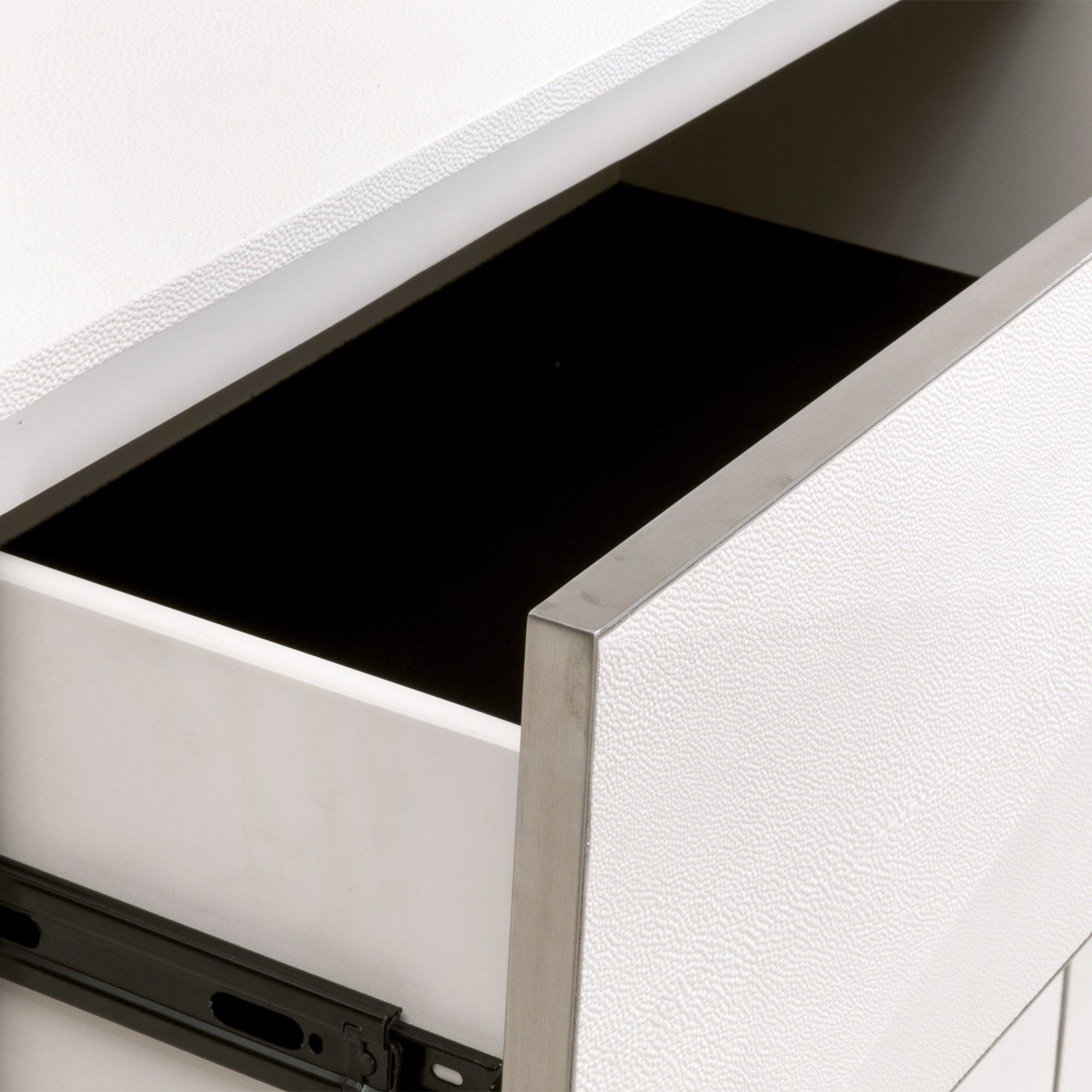 Close-up of Wynn Shagreen dresser drawer with pearl faux shagreen texture and brushed stainless steel frame by Essentials for Living